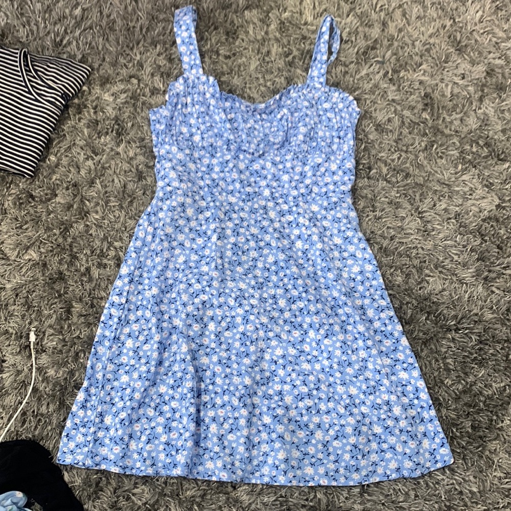 Woman’s floral blue dress